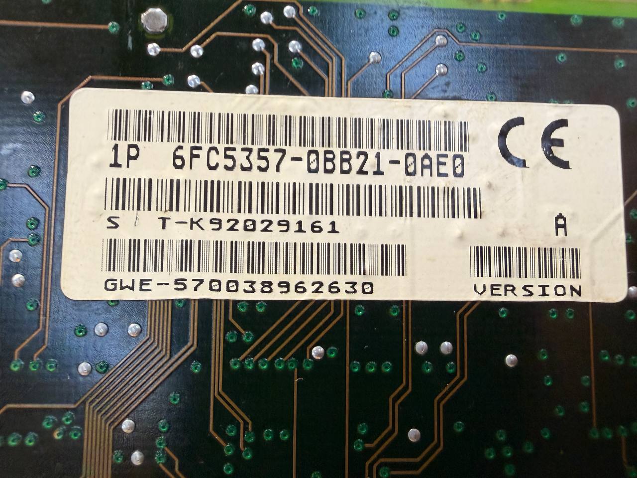 Barcodes and CE logo on a circuit board
