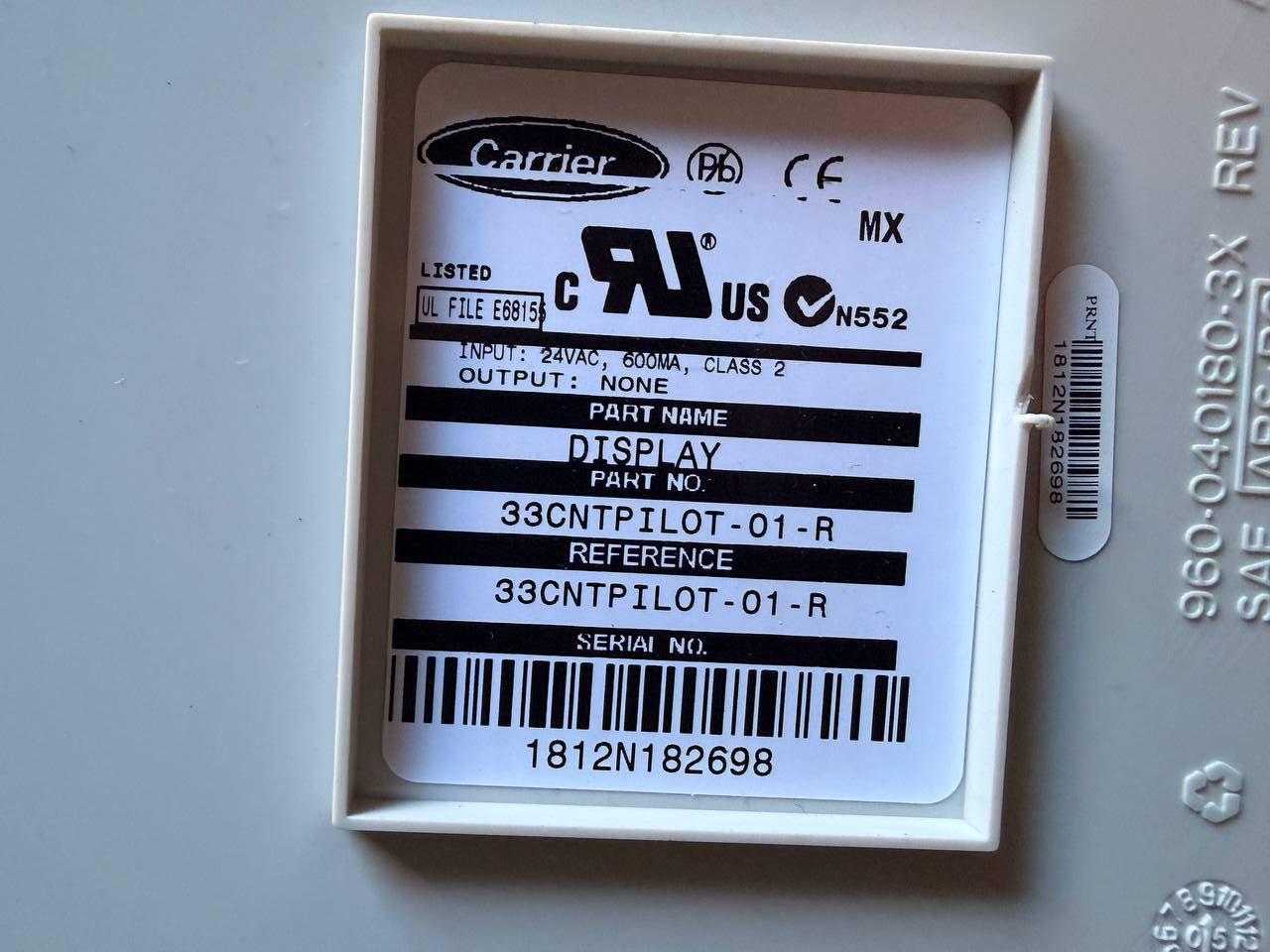 Carrier display part in a box with labels and barcodes
