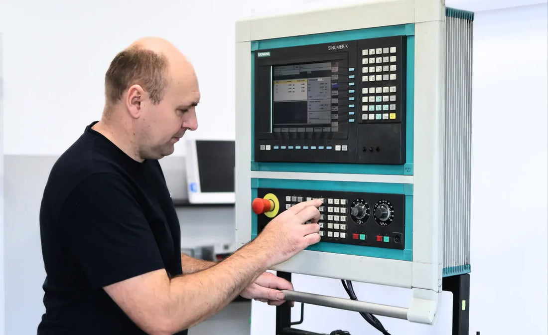 A man working with Siemens panel 840d sinumerik