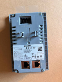 Siemens Electronic module with multiple ports and labels on a beige background