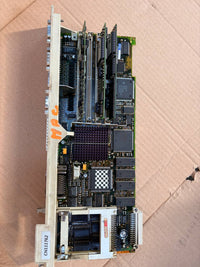 Siemen NCU - Computer motherboard on a cardboard surface