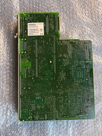 Siemens NCU 840D Green circuit board on a metallic surface