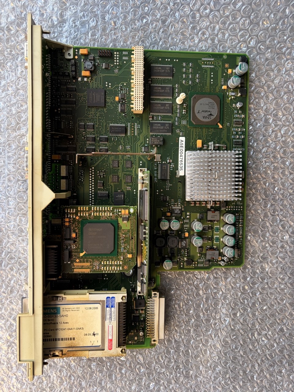Computer motherboard on a metallic surface