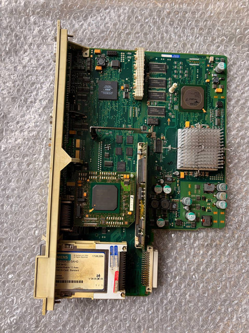 Siemens Computer motherboard on a textured gray surface