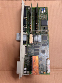 Siemens Computer motherboard on a cardboard surface