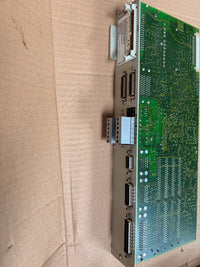 Electronic circuit board with connectors on a cardboard background