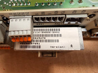 Siemens Close-up of electronic components with labels and barcodes on a brown surface
