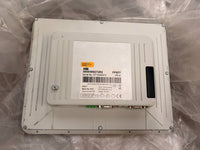 Back view of a metallic electronic device with labels on a clear background - ABB HMI