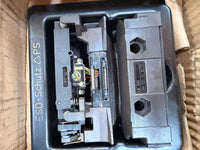 Electrical switchgear with 'ESD-Schutz' branding on a cardboard background