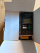 Electrical control panel inside an open cardboard box