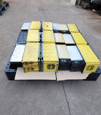 FANUC surplus lot: Pallet of larger FANUC modules with yellow covers and heatsinks