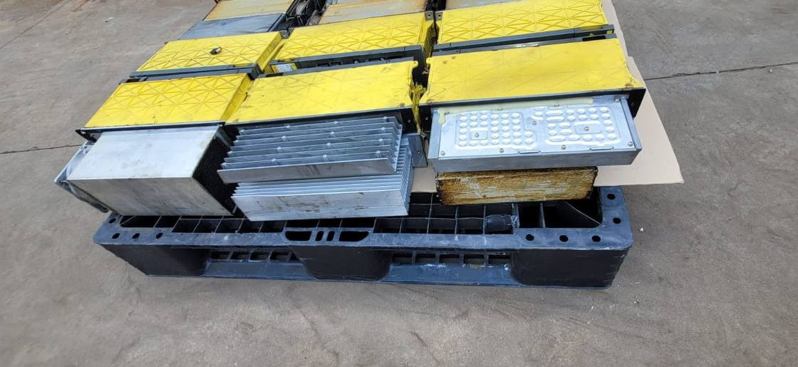 FANUC surplus lot: FANUC modules on a pallet, heatsink side