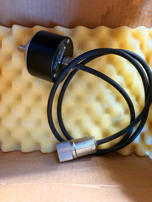 Heidenhain ROD encoder- Black cable with metal connectors on a yellow foam block