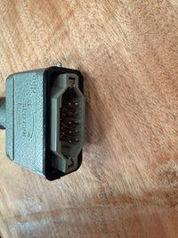 Electrical plug on a wooden surface