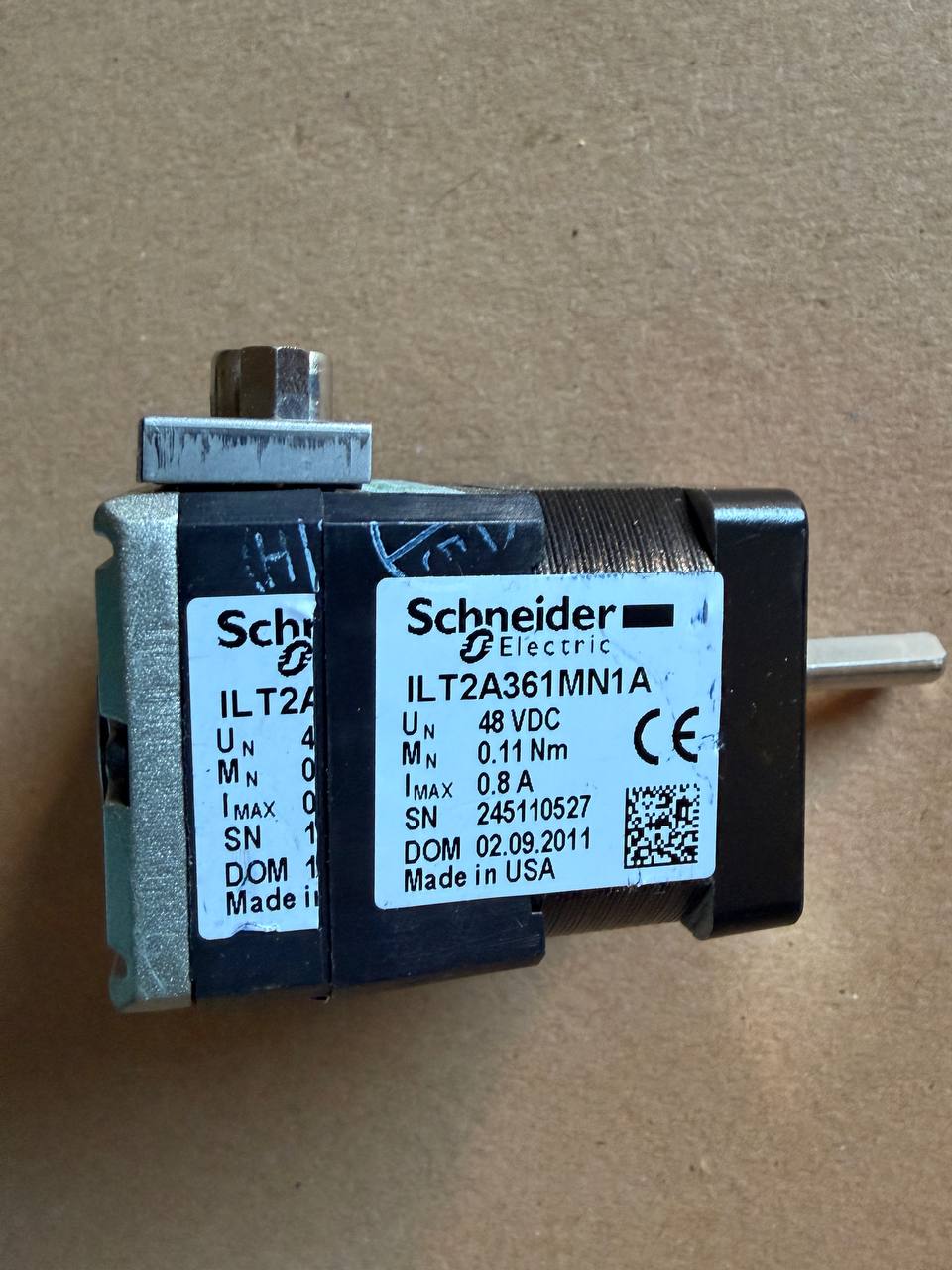 Schneider Electric relay on a brown background