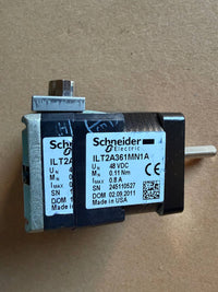 Schneider Electric relay on a brown background