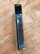 Electronic device with a screen on a wooden surface