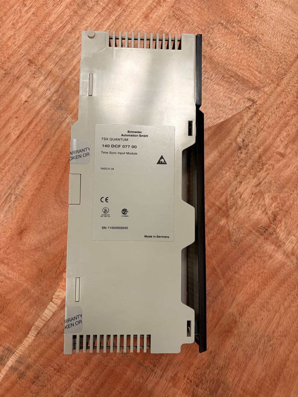 Schneider Electrical component on a wooden surface