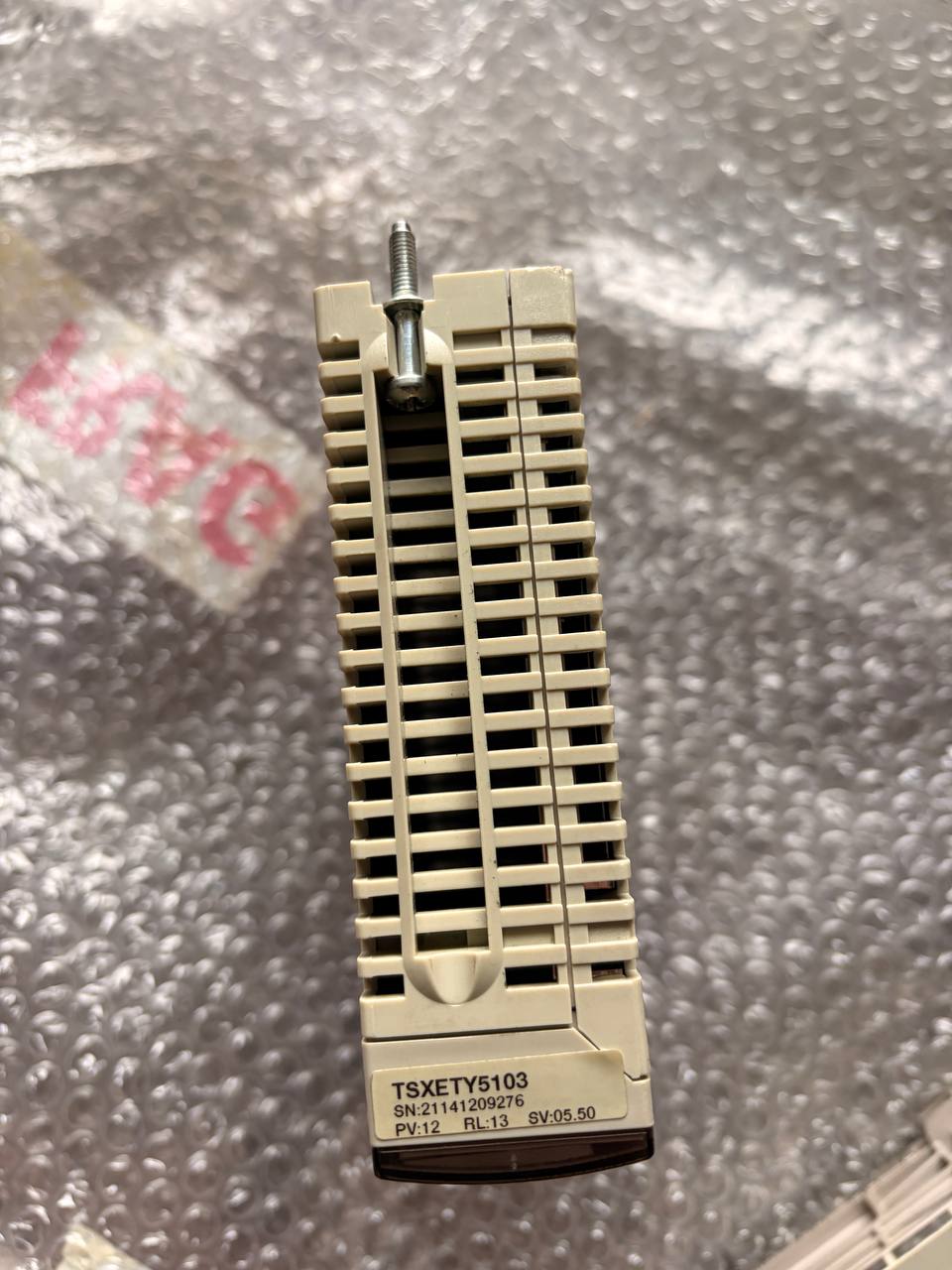 Electronic component on a textured gray background