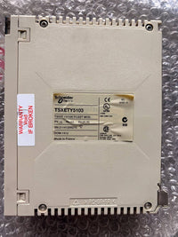 Schneider Electric industrial component on a metallic surface