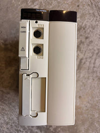 Schneider Electrical panel with multiple sockets and labels on a textured surface