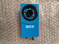 Blue sensor with 'SICK' branding on a bubble wrap background