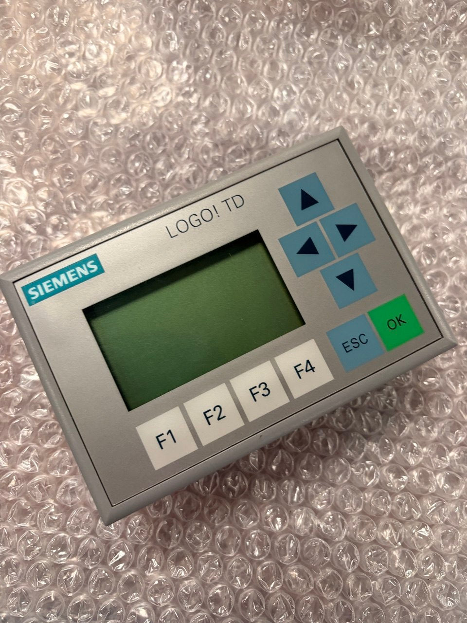 Siemens LOGO! TD control panel on a bubble wrap background