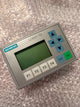 Siemens LOGO! TD control panel on a bubble wrap background
