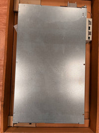 Metal panel inside a wooden cabinet