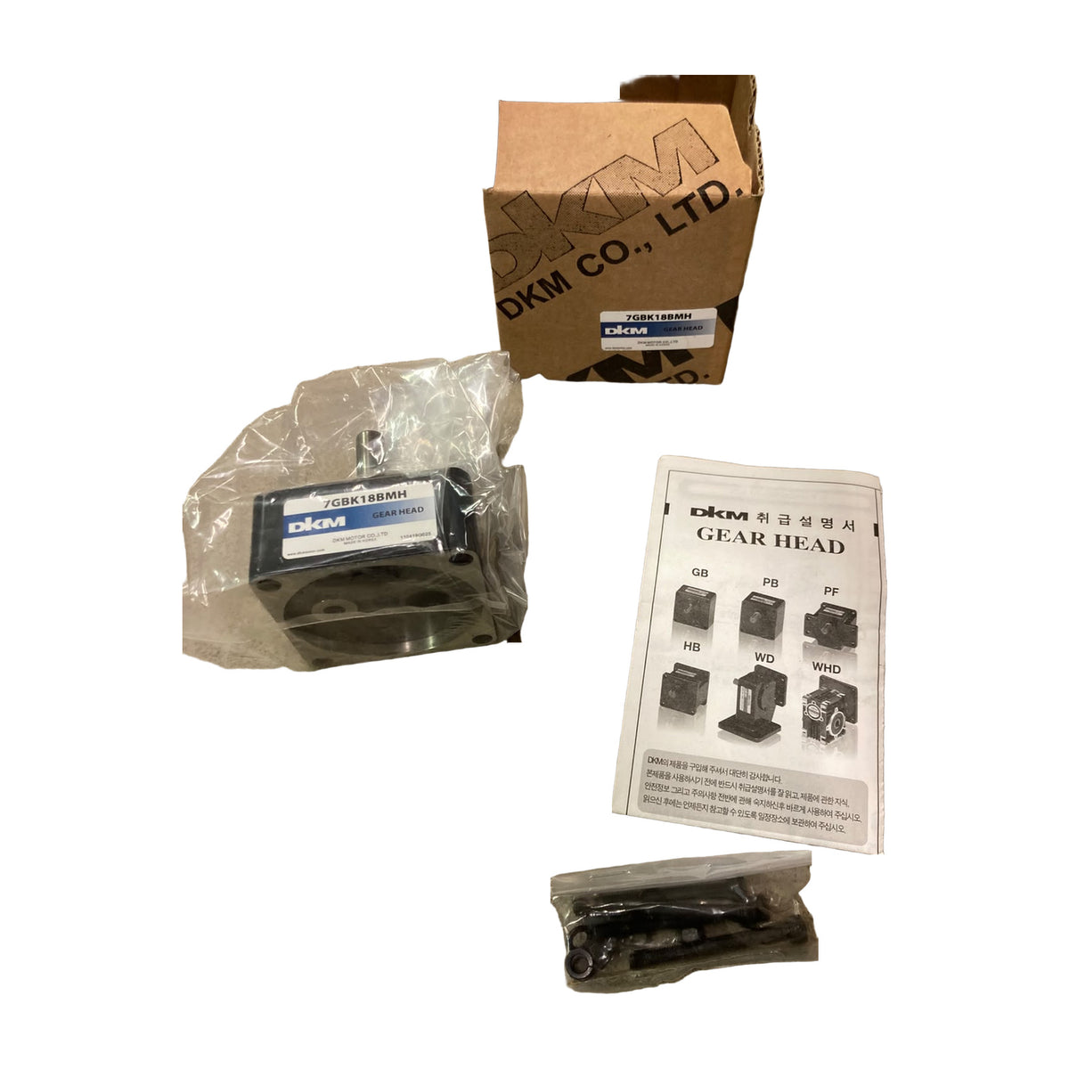 DKM 7GBK18BMH 18:1 gear head in its bag with original box, mounting screws and manual