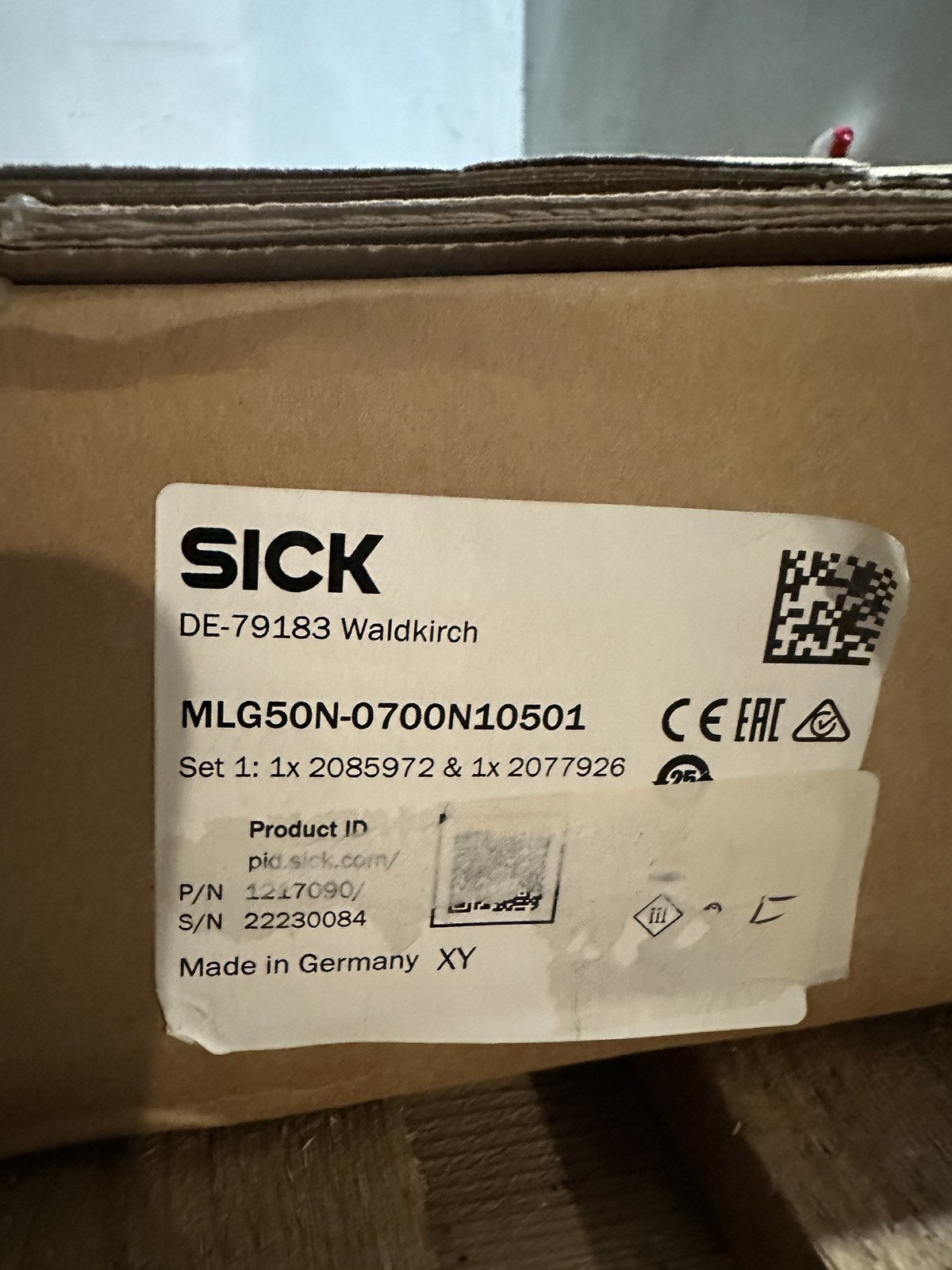 SICK MLG50N-0700N10501 box label: set of 2085972 and 2077926, P/N 1217090, made in Germany