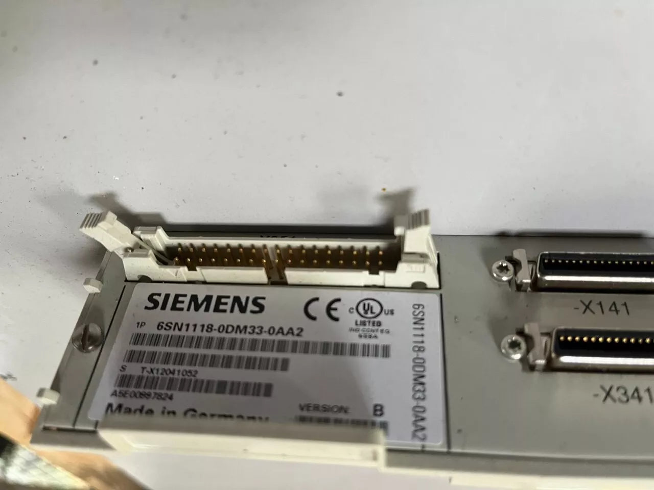 Siemens 6SN1118-0DM33-0AA2 version B side view — industrial automation spare part by Samonde